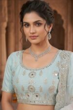 Closeup view of aqua blue embroidered lehenga choli