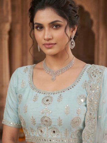 Closeup view of aqua blue embroidered lehenga choli