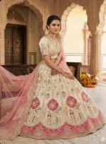 Luxury ivory and blush pink lehenga set for weddings and festive occasions