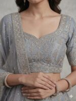 Detailed embroidery on moonstone grey designer blouse